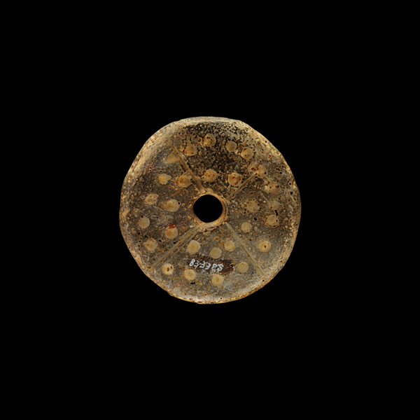 Circular spindle whorl or pendant